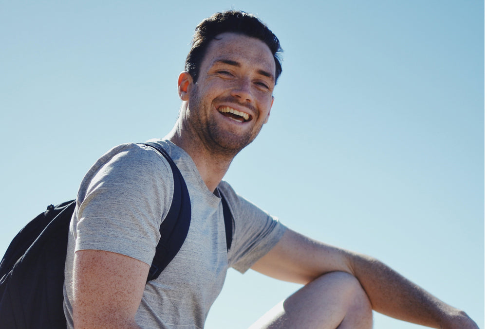 man smiling about modica superfood cocktail mix