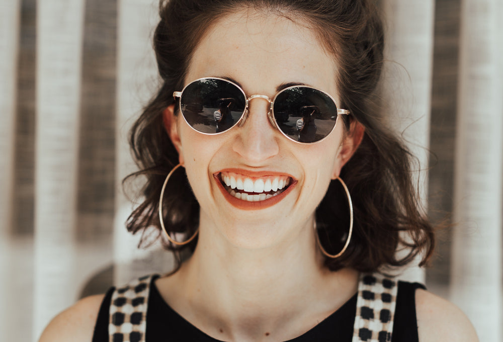 woman smiling about modica superfood cocktail mix
