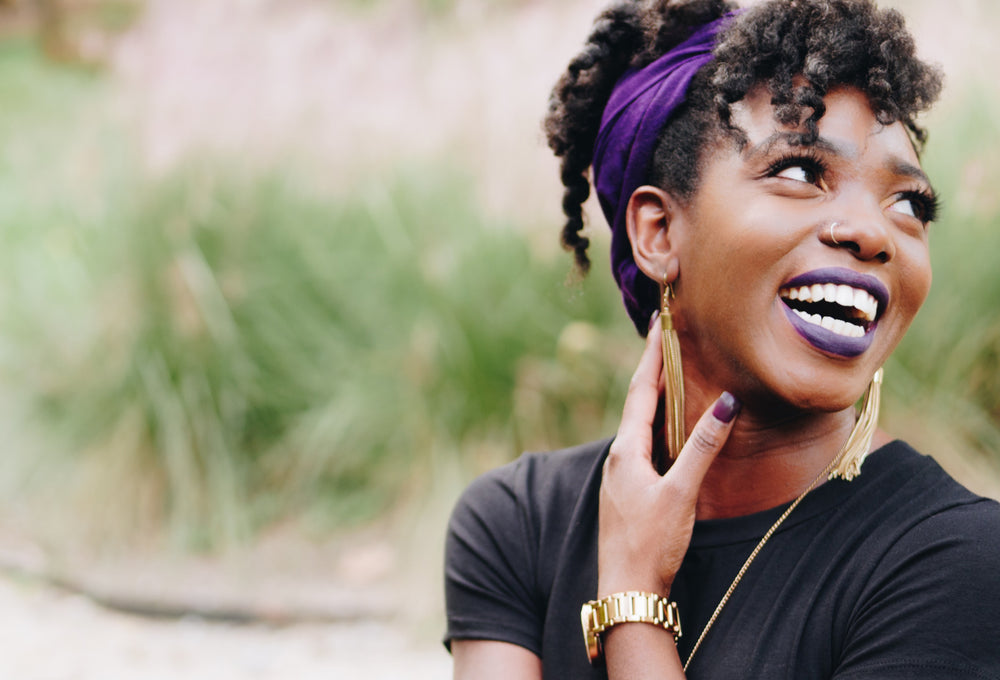 woman smiling about modica superfood cocktail mix